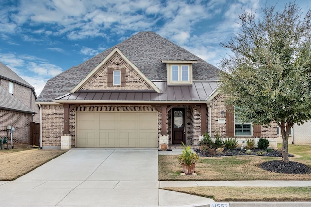 view of front facade with a front lawn and a garage