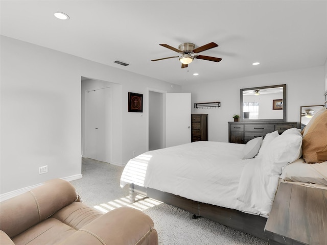 carpeted bedroom with ceiling fan