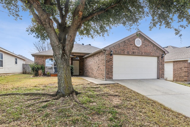 ranch-style house featuring a front yard and a garage