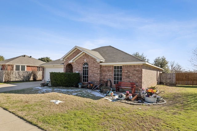 ranch-style house with a front lawn and a garage