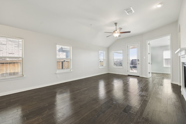 unfurnished living room with vaulted ceiling, ceiling fan, and dark hardwood / wood-style floors