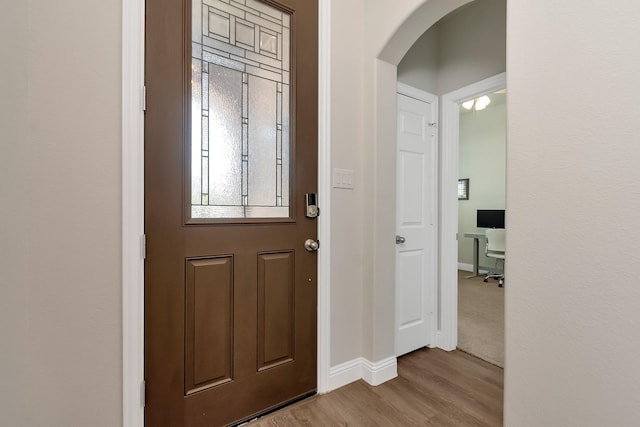 foyer entrance featuring light wood-type flooring