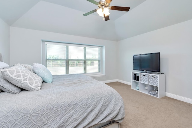 carpeted bedroom with ceiling fan and lofted ceiling