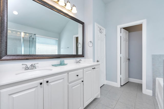 bathroom featuring tile patterned floors and vanity