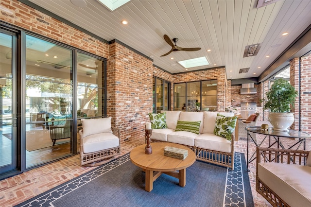 view of patio with ceiling fan and an outdoor hangout area