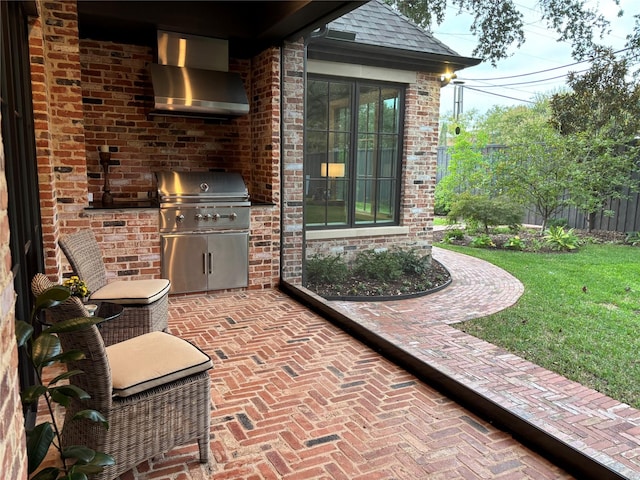 view of patio / terrace featuring an outdoor kitchen