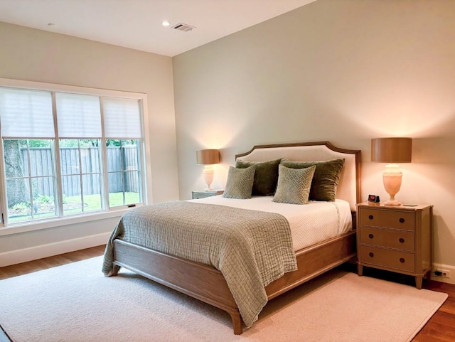 bedroom featuring hardwood / wood-style flooring