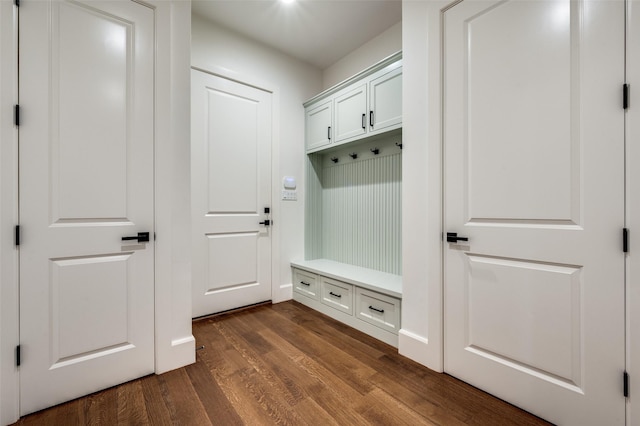 mudroom with dark hardwood / wood-style floors