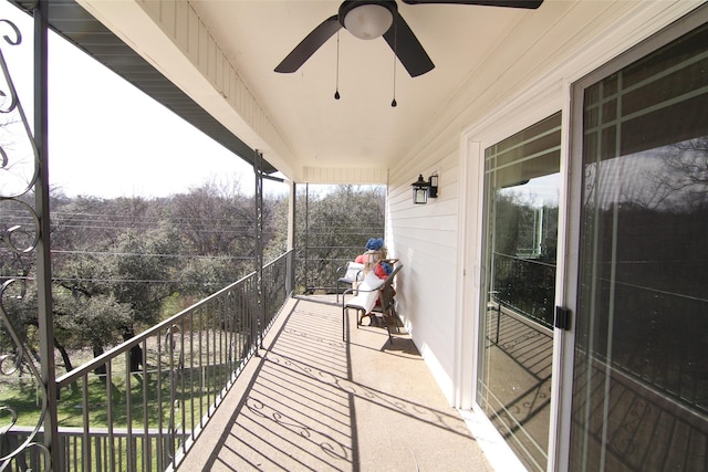 balcony featuring ceiling fan