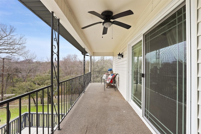 balcony featuring ceiling fan