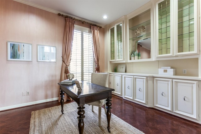 office area with ornamental molding and dark parquet floors