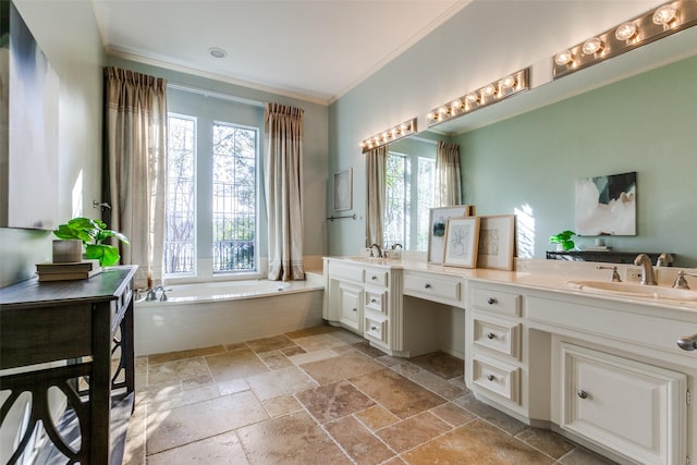 bathroom featuring a tub, ornamental molding, and vanity