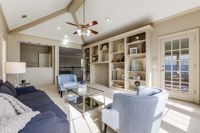 living room with ceiling fan, light colored carpet, lofted ceiling with beams, and crown molding