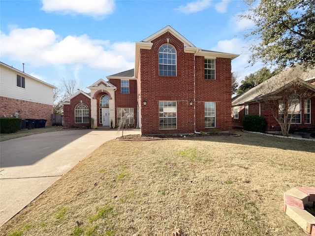 view of front of home with a front lawn