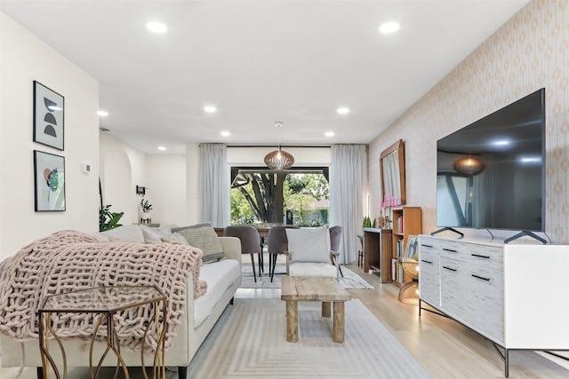 living room with light hardwood / wood-style floors