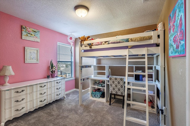 bedroom with dark carpet and a textured ceiling