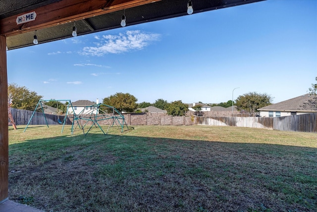 view of yard with a playground