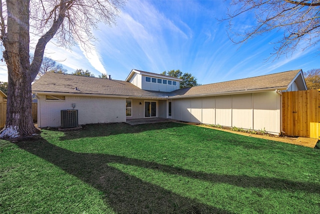 view of yard featuring cooling unit and a patio