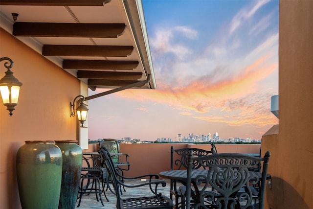 view of patio terrace at dusk