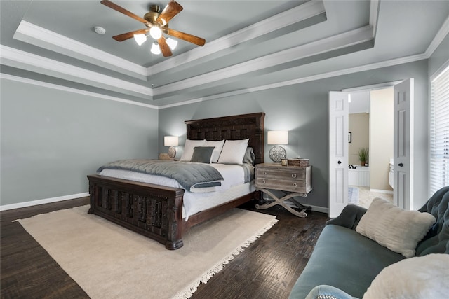 bedroom with a raised ceiling, ceiling fan, crown molding, and multiple windows