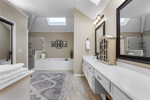 bathroom featuring separate shower and tub, ornamental molding, lofted ceiling with skylight, and vanity