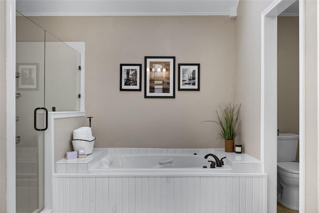 bathroom featuring toilet, shower with separate bathtub, and ornamental molding