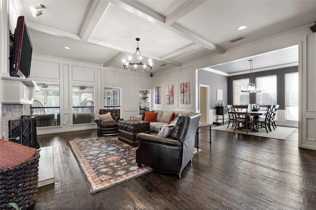 living room featuring beamed ceiling, dark wood-type flooring, an inviting chandelier, and coffered ceiling