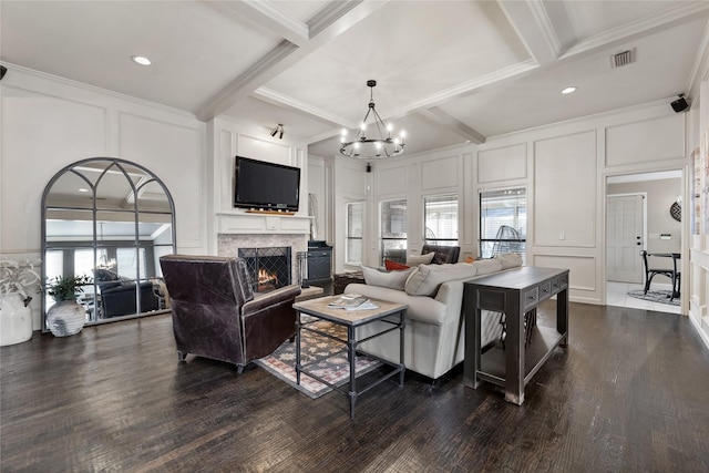 living room featuring dark hardwood / wood-style flooring, beam ceiling, crown molding, and coffered ceiling