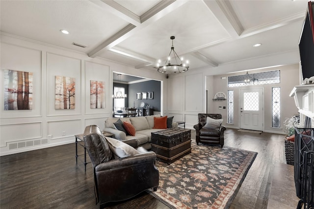 living room with beamed ceiling, ornamental molding, coffered ceiling, and dark hardwood / wood-style floors