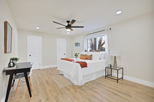 bedroom featuring ceiling fan and light wood-type flooring