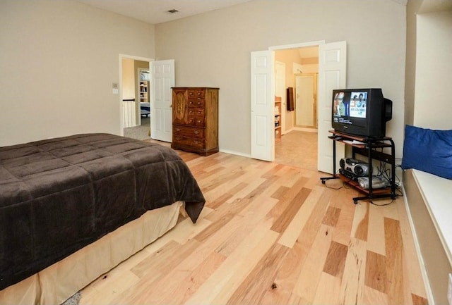 bedroom with light hardwood / wood-style floors