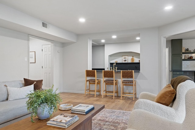 living room with light hardwood / wood-style floors