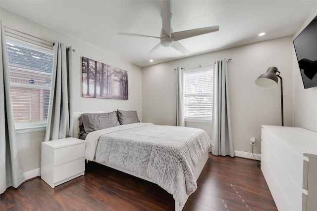 bedroom featuring ceiling fan and dark hardwood / wood-style floors