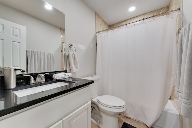 full bathroom with toilet, vanity, and shower / bath combo with shower curtain