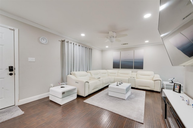 living room with ceiling fan, dark wood-type flooring, and crown molding