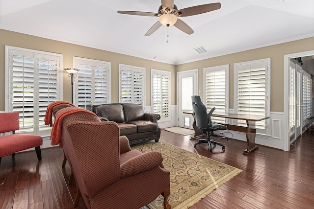 living room with ceiling fan and dark hardwood / wood-style floors