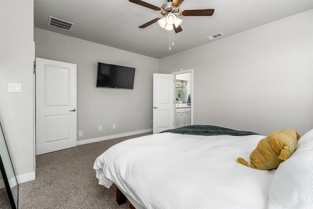 bedroom featuring ceiling fan, ensuite bathroom, and carpet flooring