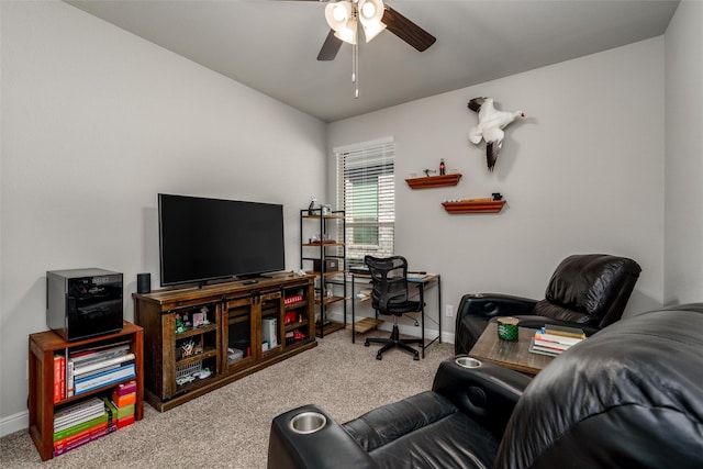 office area with ceiling fan and carpet