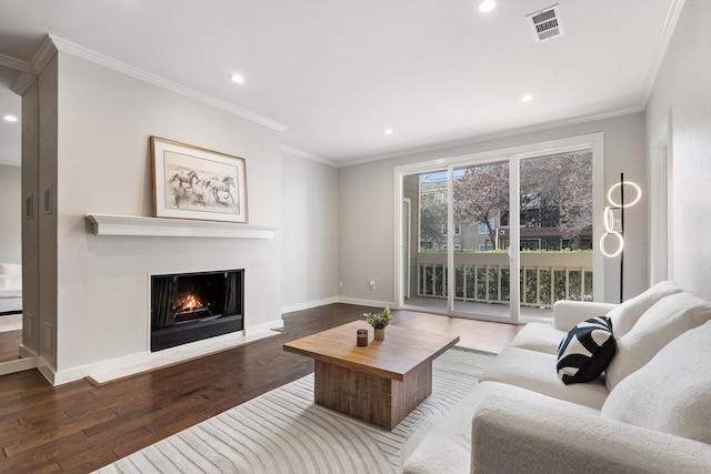 living room with ornamental molding and dark wood-type flooring