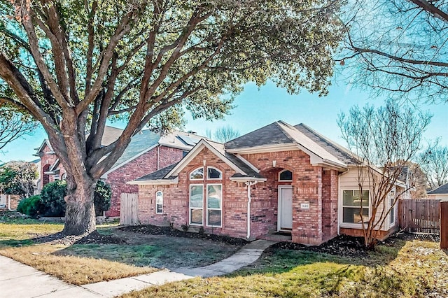 view of front of house with a front lawn