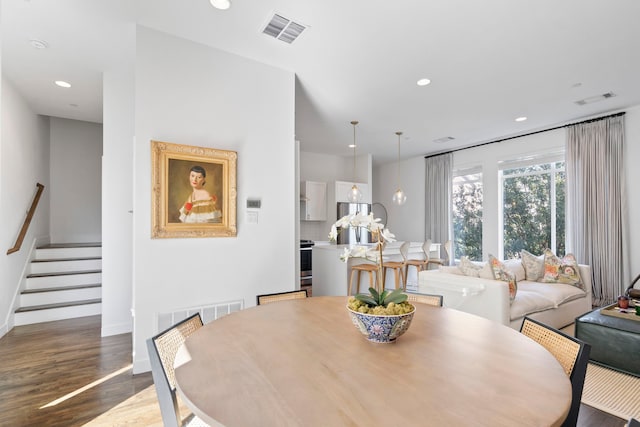 dining area featuring hardwood / wood-style flooring