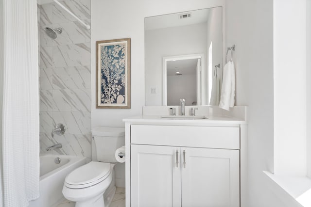 full bathroom featuring shower / bathtub combination with curtain, vanity, and toilet