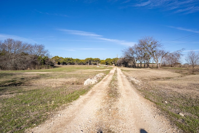 view of road with a rural view