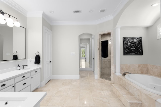 bathroom featuring tile patterned floors, vanity, crown molding, and shower with separate bathtub