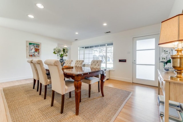 dining room featuring light wood-type flooring