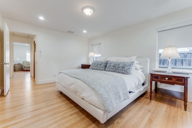 bedroom featuring light hardwood / wood-style flooring