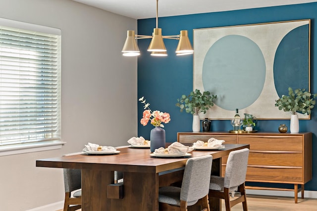 dining space featuring light hardwood / wood-style floors