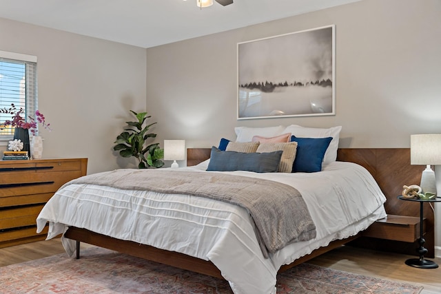 bedroom featuring wood-type flooring