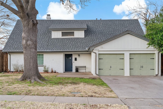 view of front of property featuring a garage