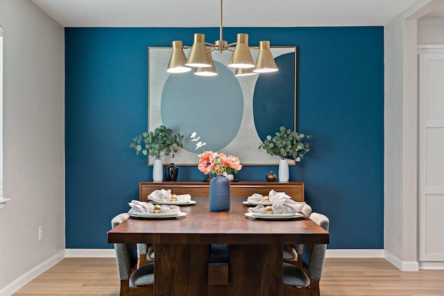 dining area with light hardwood / wood-style floors